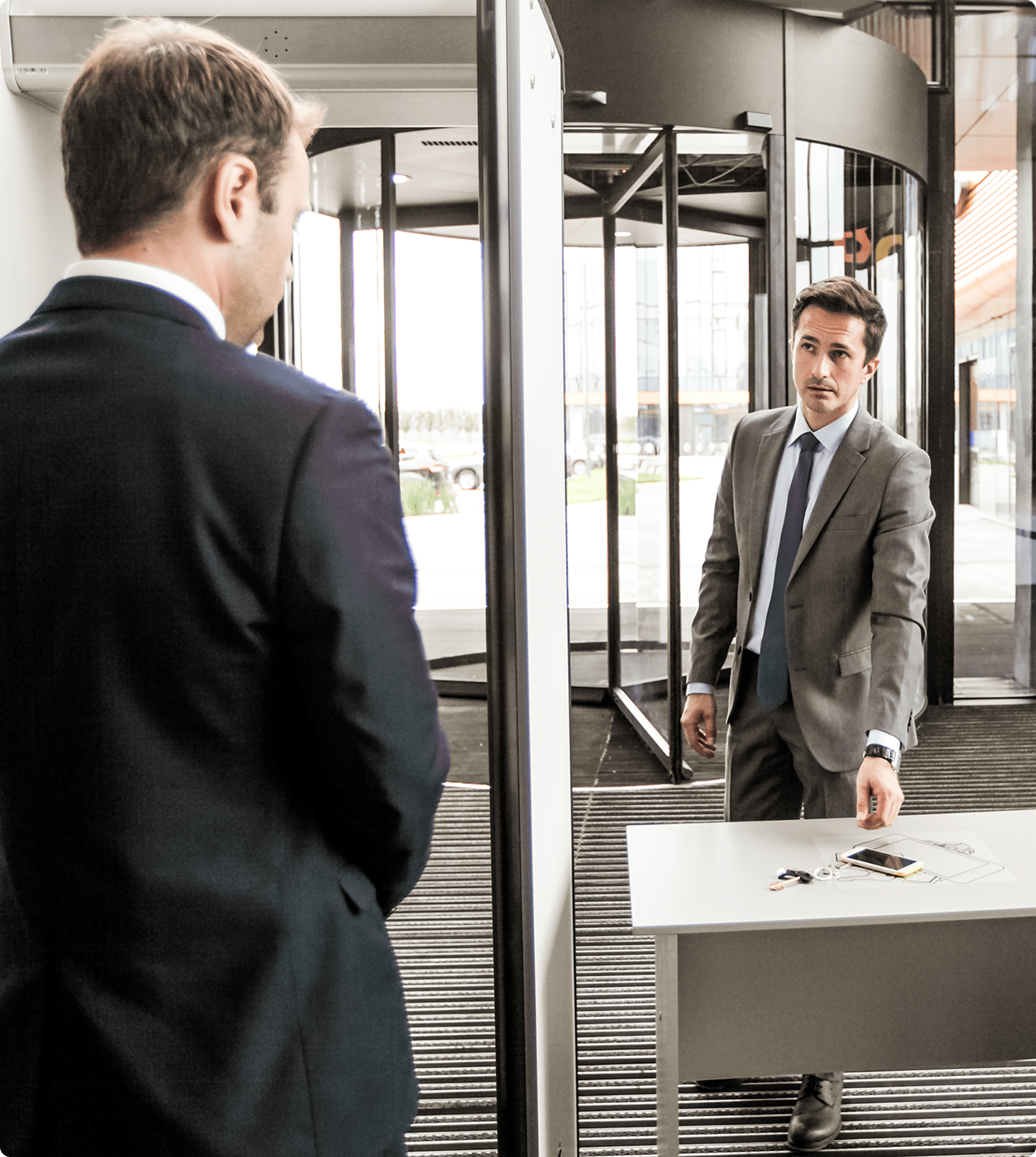 Man walking through security.